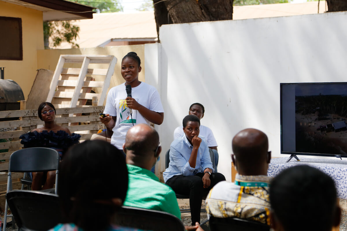 A participant of the Envisioning Resilience initiative in Ghana tells the story behind a photo she captured showing the impacts of climate change on her life. Photo: Dennis Nipah