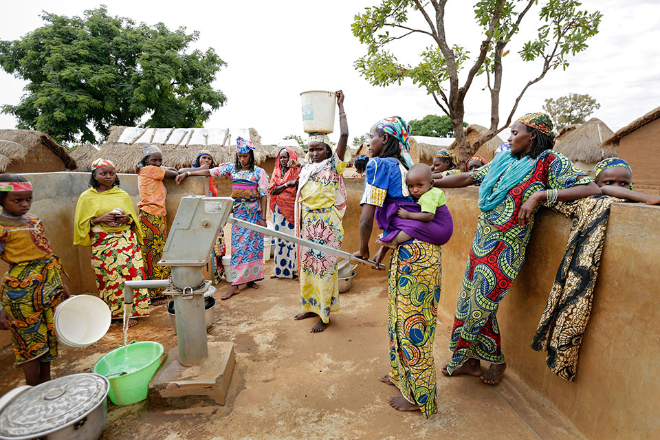 At the Gado-Badzere camp, there is one water pump for every 423 refugees. There are constant lines at the water points, and places in line are held by jugs and buckets.Photo: UN Women/Ryan Brown