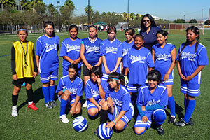 Anita DeFrantz (final row) with participants from the Kids In Sports (KIS) project, created by the LA84 Foundation, during a girls’ football event in Los Angeles in 2011. KIS offers year-round programmes at sports clubs throughout Los Angeles, and has grown a girls’ programme from 300 to more than 3,000. Anita DeFrantz was President of KIS from 1994 to 2012 and remains a Board member.