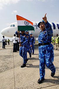 Marking a first in the history of UN peacekeeping, an all-female Formed Police Unit arrived in Liberia on 30 January to strengthen the rule of law and maintain peace in the war-torn country as part of the United Nations Mission in Liberia(UNMIL). The 103-strong operational unit from India will receive logisitics support from 22 men. UN Photo/Eric Kanalstein