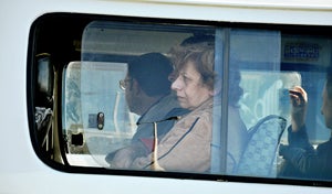 Egyptian woman looking through the window