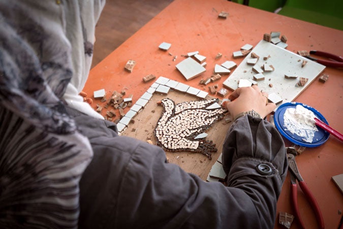 A Syrian woman attends a handicraft workshop. (UN Women/Christopher Herwig)