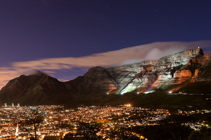 Cape Town, South Africa’s Table Mountain was lit orange on 25 November to raise awareness about violence against women. Photo: City of Cape Town/Bruce Sutherland