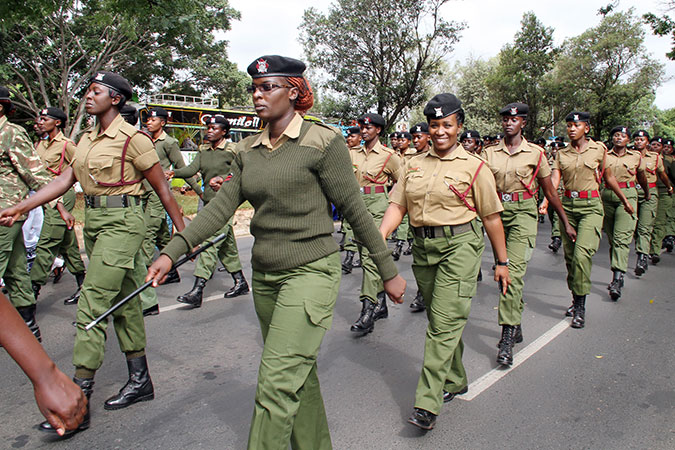Women police officers march in a parade on international women’s day 2016. Photo: UN Women/Kennedy Okoth