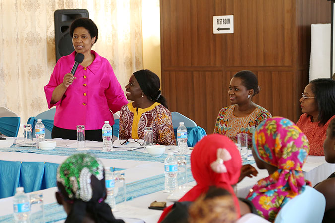 UN Women Executive Director Phumzile Mlambo-Ngcuka met with an excited group of adolescent girls to listen to their ideas and challenges in Liberia. Photo: UN Women/Stephanie Raison