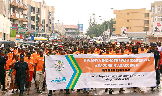 Members of Government, Civil Society, and Students march together in Kigali city to mark the 16 Days of Activism  Photo: UN Women/Tumaini Ochieng