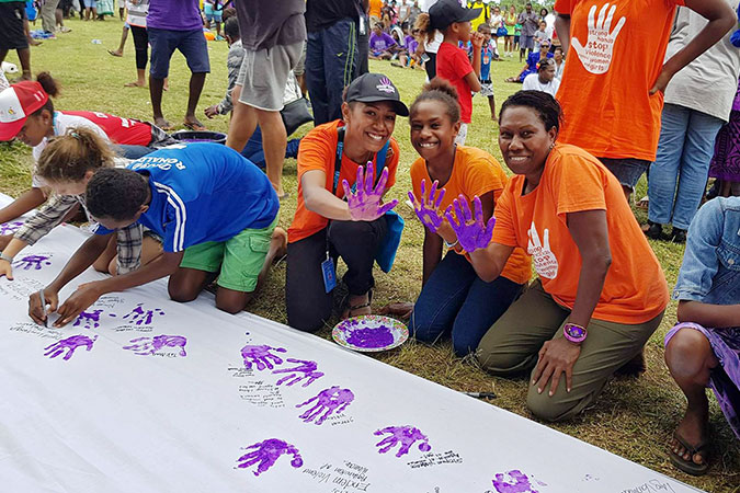 UN Women is supporting the Vanuatu Government and its partners to spread the message to end violence against women and girls, joining a coalition to “Stanap strong akensem vaelens” (stand up against violence). Photo credit: UN Women/Trisha Toangwera and Betty Zinner-Toa