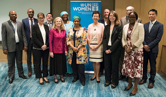 Phumzile Mlambo-Ngcuka, Executive Director of UN Women poses for a picture with various development partners after a breakfast meeting. Photo: UN Women/Franz Stapelberg