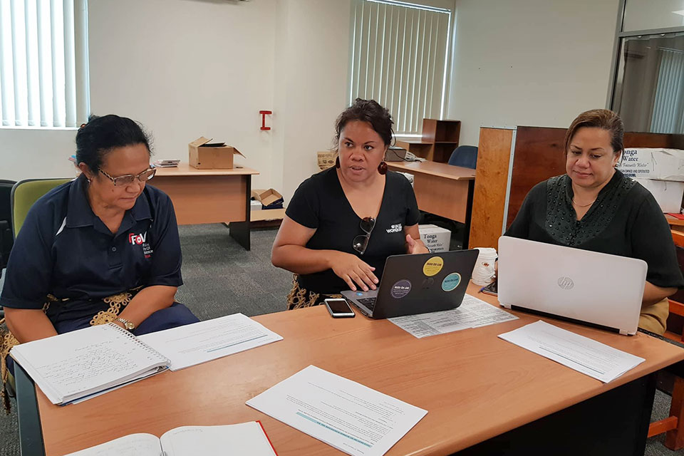 UN Women Monitoring, Evaluation and Knowledge Management Coordinator Kolianita Alfred (middle) in a briefing with Head of the Women’s Affairs Division, Polotu Fakafanua- Paunga (right) of the Ministry of Internal Affairs and another colleague. Photo: UN Women/Mele Maualaivao