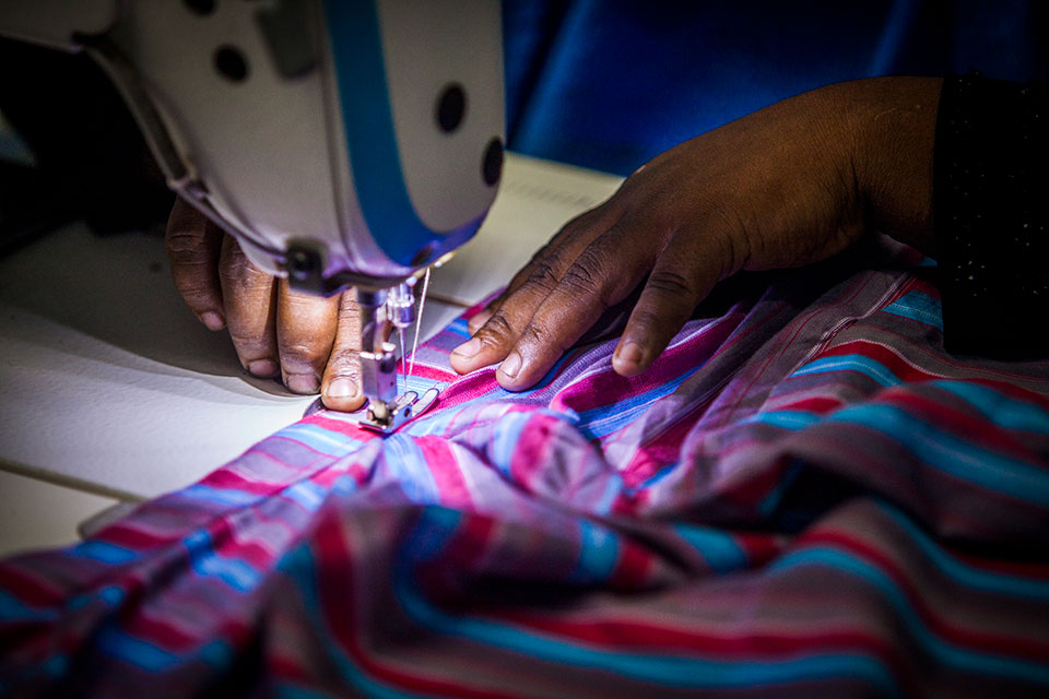 Hands of a worker plying her trade at Glamour Boutique House and Training Center. Photo: UN Women/Fahad Kaizer