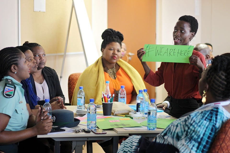 Esther Antonius a Development Officer (Legislature) from the Namibian Ministry of Gender Equality, Women and Child Welfare shows her groups’ hashtag at the Youth Peace Lab. The Lab was one of the working groups at the 3rd Capital Level Meeting of the Women Peace and Security Global Focal Points Network. Photo: UN Women/Otae Mkandawire.