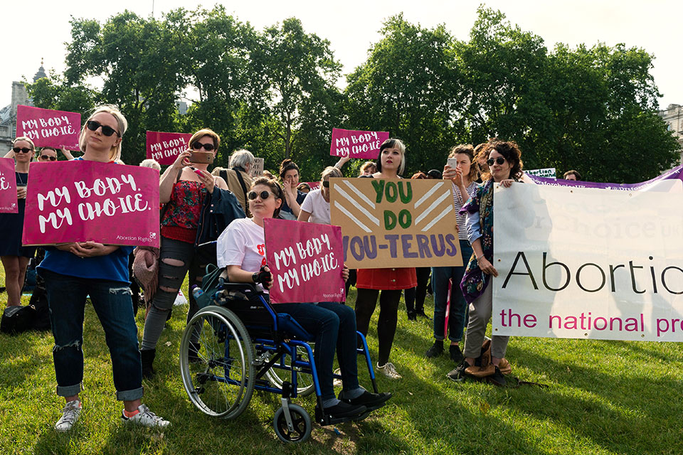 Shortly after the Ireland referendum, protesters in London hold “My Body, My Choice” placards during a pro-choice campaign outside the Houses of Parliament. Photo: Getty Images/ Charles McQuillan