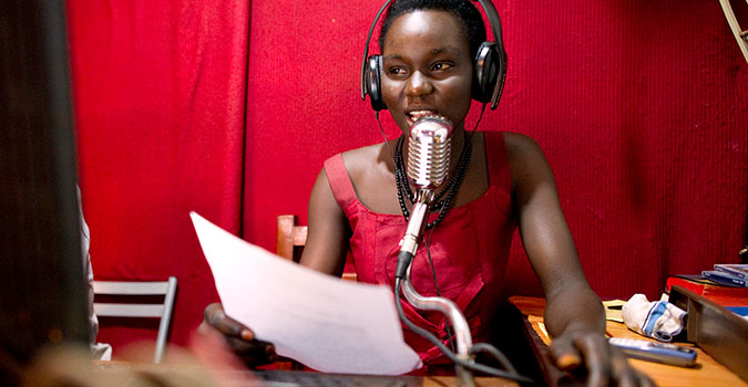 Newscaster Lady Belinda Juaw at the community radio station Spirit FM 99.9 Yei in South Sudan, spreads information about the importance of voting, particularly for young women. Photo: Norwegian People’s Aid/Werner Anderson via Flickr CC 2.0.