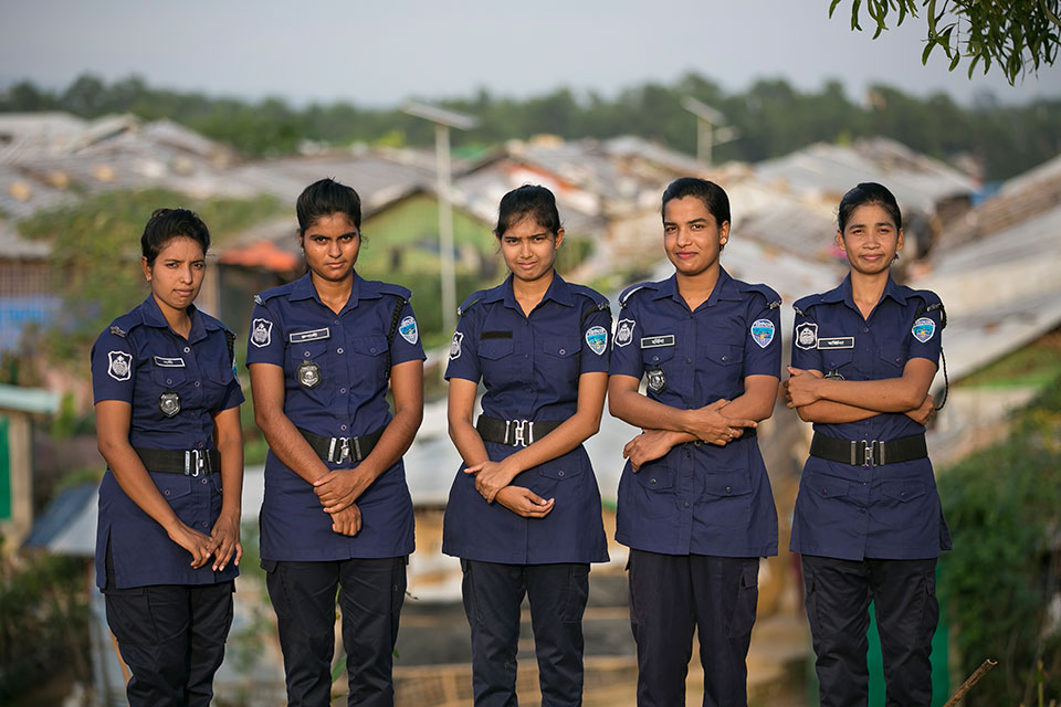 Bangladeshi women police pose for a photo at their duty station in 2019.  Photo: UN Women/Allison Joyce.