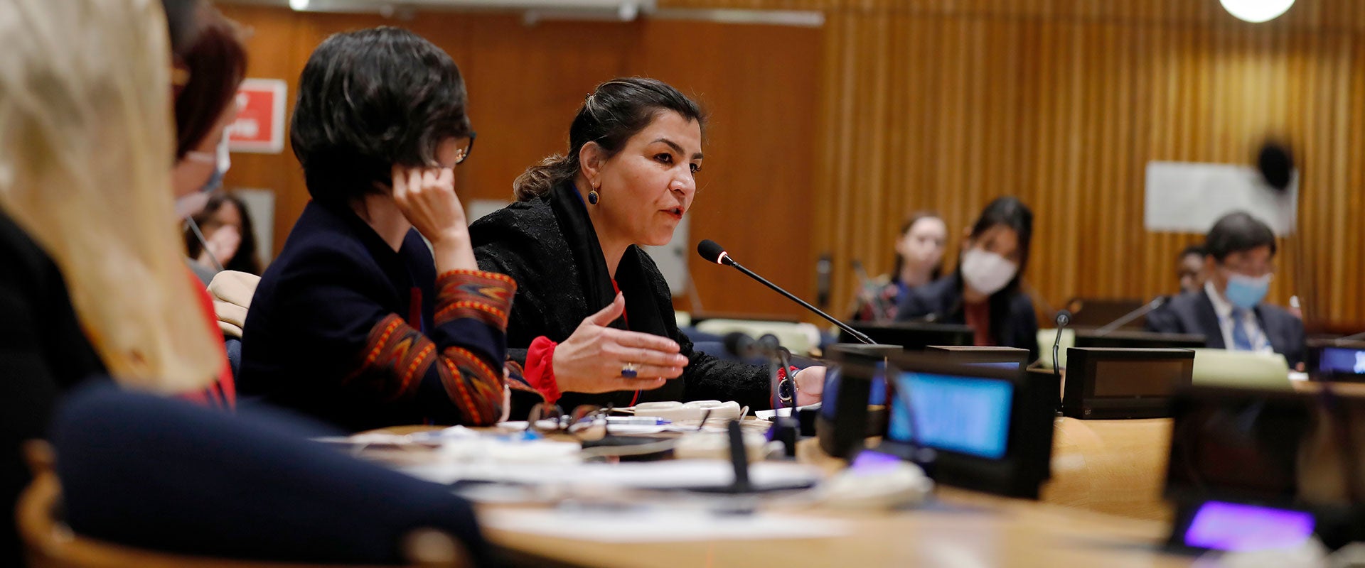 Horia Mosadiq, an Afghan woman and founder and director of Safety and Risk Mitigation Organization, addresses the CSW66 side event on the upcoming renewal of the UNAMA mandate. Photo: UN Women/Ryan Brown