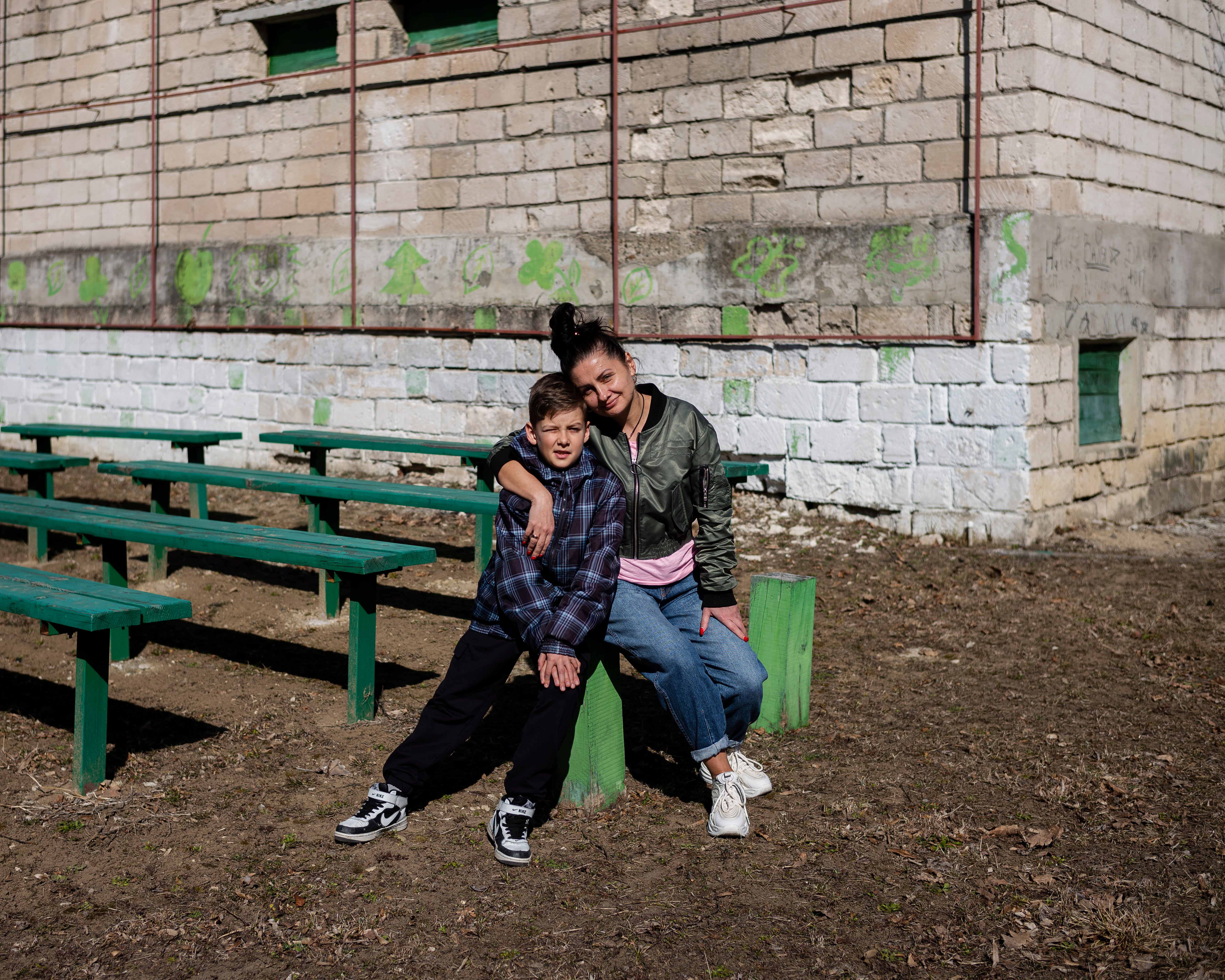 Snejana, 41, from Odessa, together with her son David, 11, at a temporary placement center in Scoreni, Straseni district, Moldova.