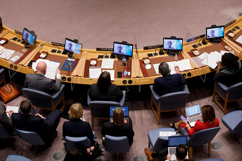 An overhead view of the UN Security Council Open Debate on Women, Peace and Security as Bineta Diop, Special Envoy on Women, Peace and Security of the Chairperson of the African Union Commission speaks on screen. Photo: UN Women/Ryan Brown