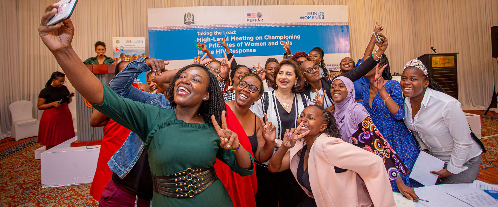 A selfie moment with emerging young leaders, beneficiaries of a UN Women programme on young women’s leadership in the HIV response. Photo: UN Women/Rashid Hamis Kindamba 