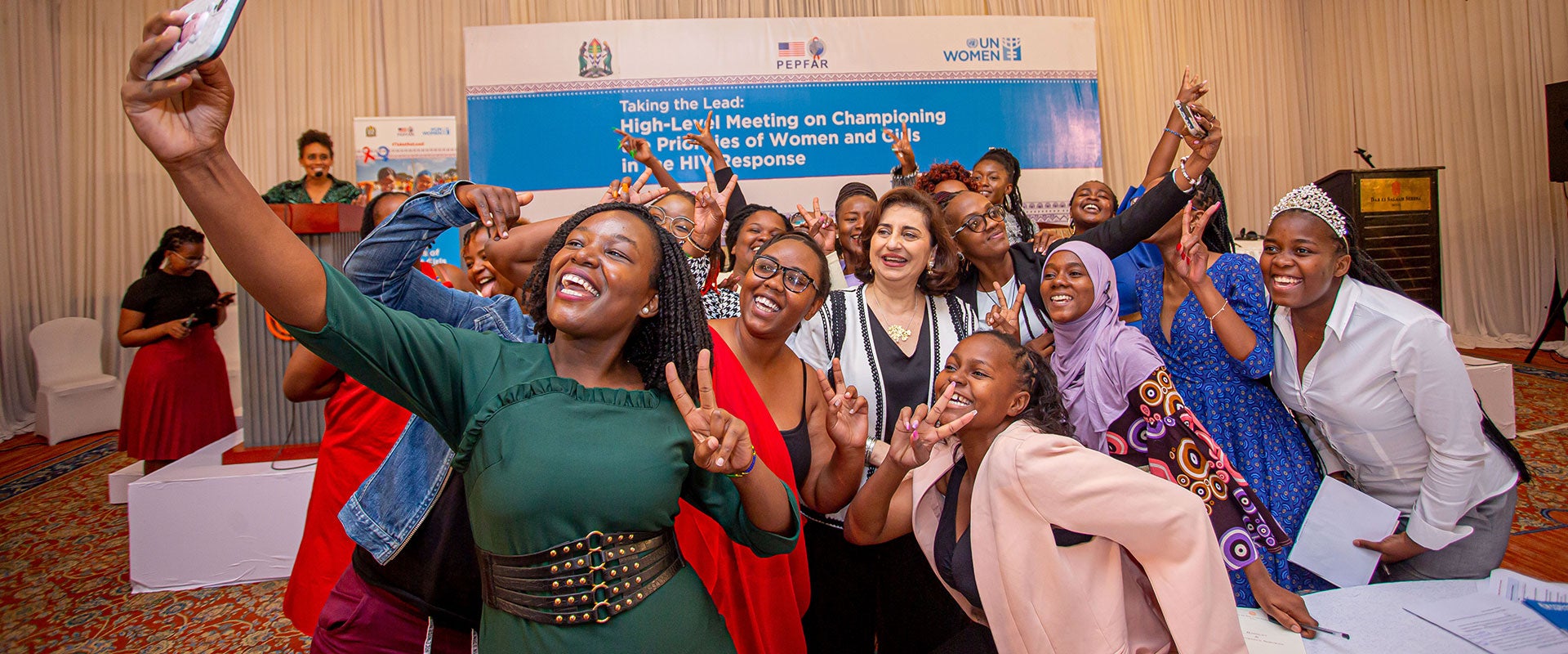 A selfie moment with emerging young leaders, beneficiaries of a UN Women programme on young women’s leadership in the HIV response. Photo: UN Women/Rashid Hamis Kindamba