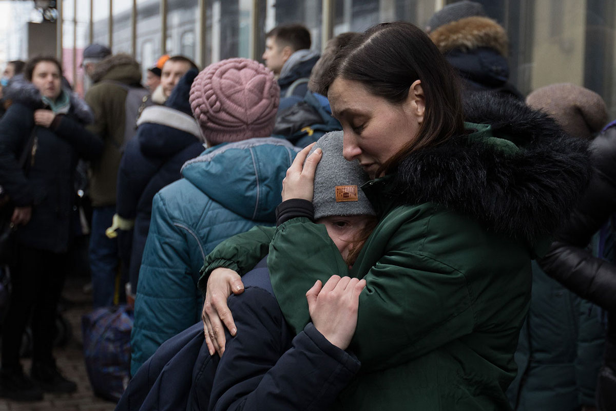 People in Kyiv, Ukraine crowd the train stations trying to get out of the country during the Russian invasion, but the evacuation trains are not enough for everyone. 1 March 2022. Photo: Sebastian Backhaus/Agentur Focus/Redux.