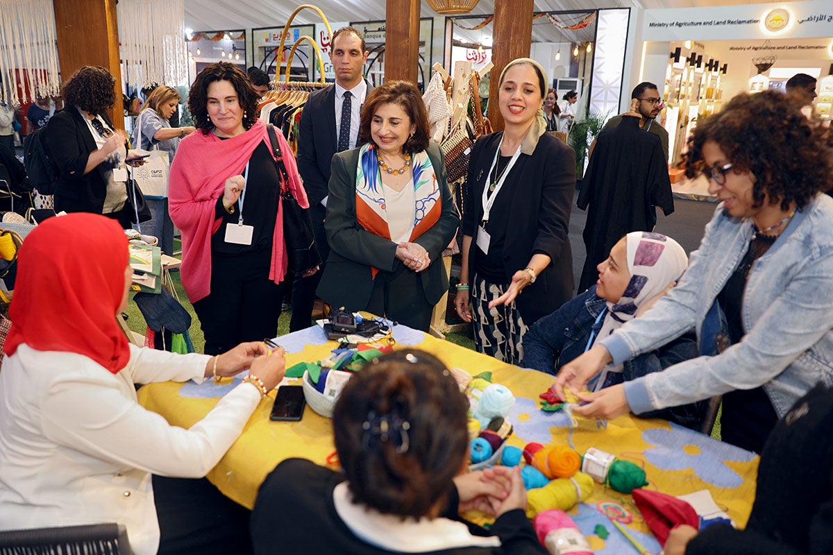 Joined by UN Women Egypt Country Representative Christine Arab, Dr. Sima Bahous visits the Egyptian National Council for Women’s exhibition in the Green Zone at COP27 on 15 November 2022. Photo courtesy of the National Council for Women