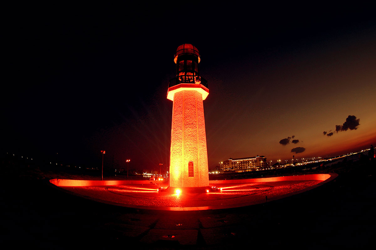 A unique landmark marking where the Nile meets the Mediterranean, the lighthouse in Ras El-Bar, Damietta, Egypt was lit in orange to commemorate the 16 Days of Activism, using energy-saving lights and equipment to ensure low energy consumption. Photo: UN Women/Islam Ahmed