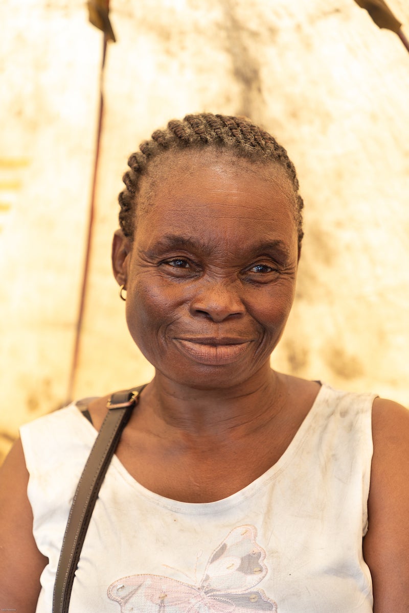 Suzanne Ilambe is a palm oil seller and mother of eight. Photo: UN Women/Yulia Panevina