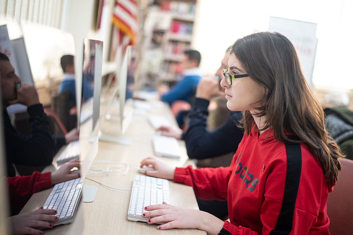 Jonada Shukarasi is one of three 16-year-old girls who developed an app aimed at tackling the severe problem of domestic violence across Albania. Called GjejZâ (Find your Voice), the app provides comprehensive information to women suffering from abusive behavior. Jonada and her team were awarded first place scholarships at the 2019 Technovation World Pitch Summit for their work. Photo: UN Women/Eduard Pagria