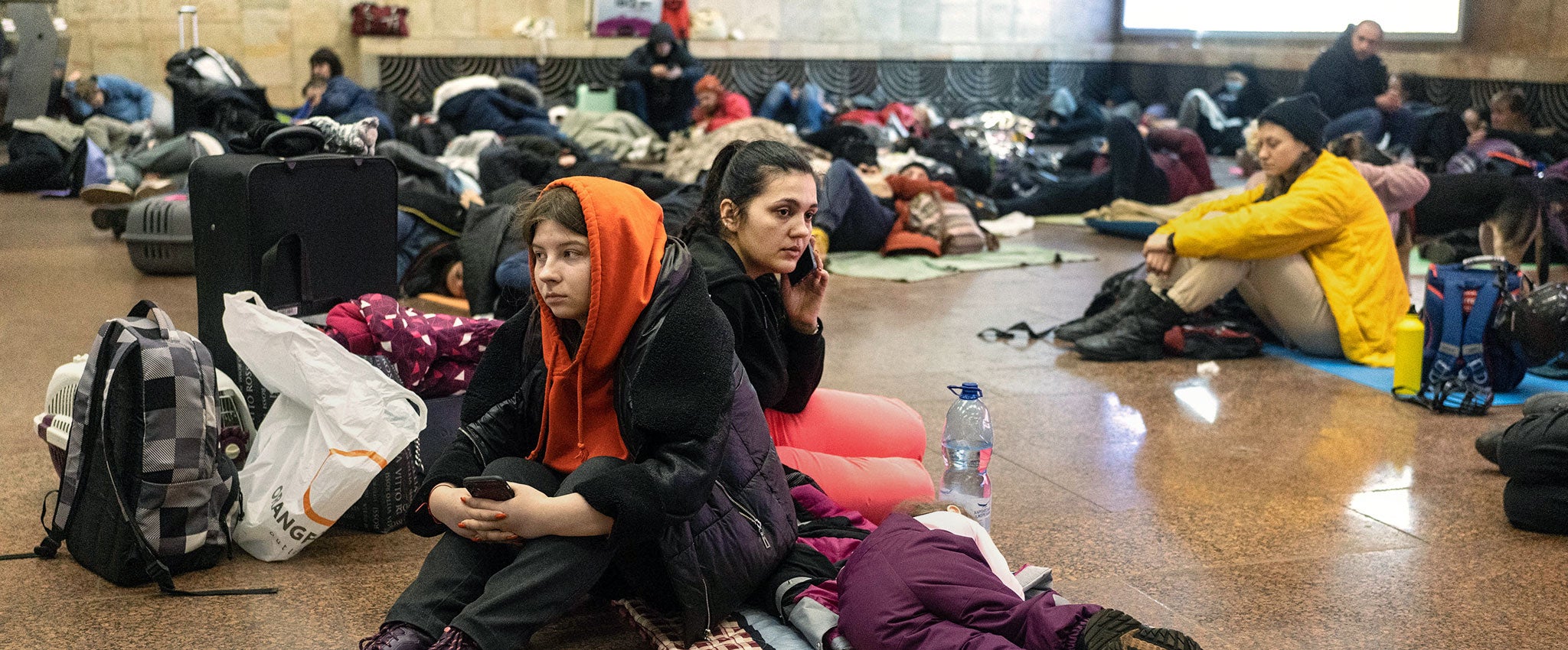 Citizens of Kyiv, Ukraine spend the night at the metro station Heroes of the Dnieper during the first days of the war in February 2022. Photo: UN Women/Serhii Korovainyi