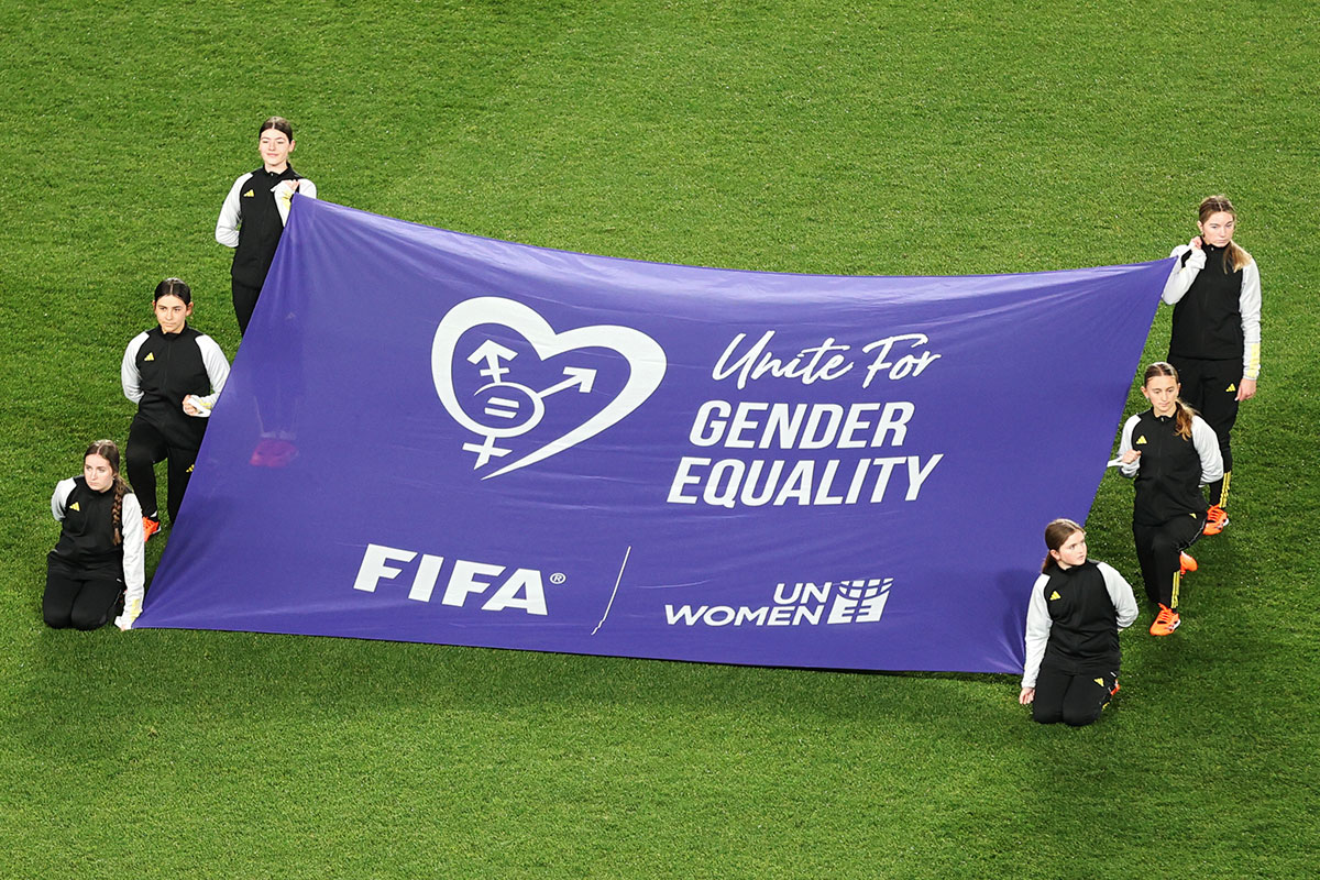 Dalian Wanda Flag Bearers display a “Unite for gender equality” banner during the FIFA Women’s World Cup 2023 Group E match between Portugal and USA on 1 August 2023 in Auckland/Tāmaki Makaurau, New Zealand. Photo: FIFA/Fiona Goodall.