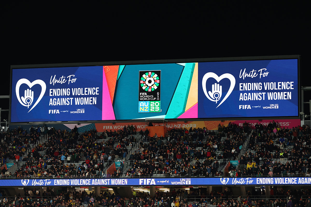 LED boards feature the UN Women and FIFA message “Unite for ending violence against women” during the FIFA Women’s World Cup 2023 semi-final match between Spain and Sweden on 15 August 2023 in Auckland/Tāmaki Makaurau, New Zealand. Photo: FIFA/Jan Kruger.
