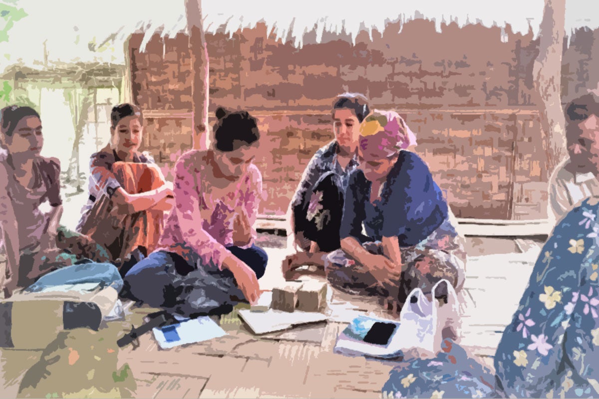 A group of women receives cash assistance for their animal husbandry collective from the CERF programme. Illustration based on a photo by UN Women.