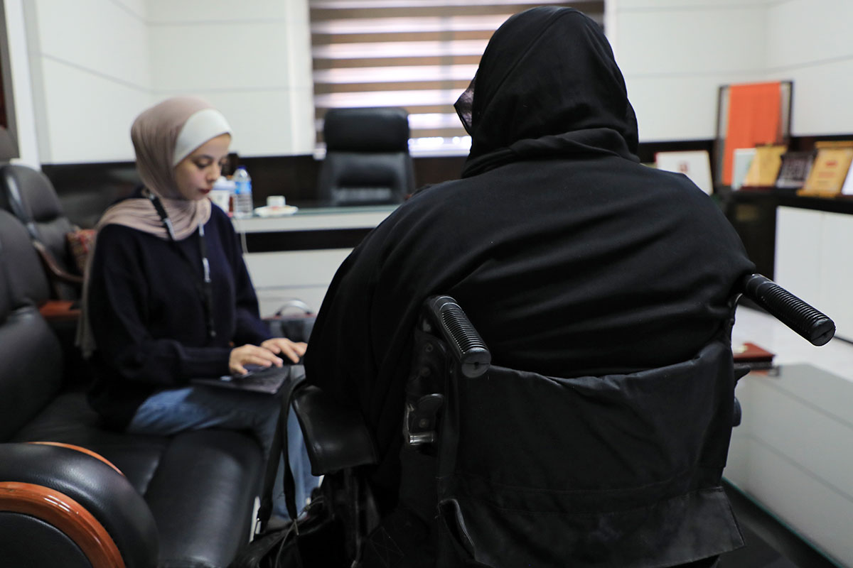 Interview of a refugee woman with disability from the Gaza Strip who received cash assistance and a cash-for-work opportunity through the CERF programme. The livelihood assistance was paired with skill development trainings and gender-based violence (GBV) protection services, including legal counselling, awareness-raising sessions, and psychosocial support. Photo: UN Women.