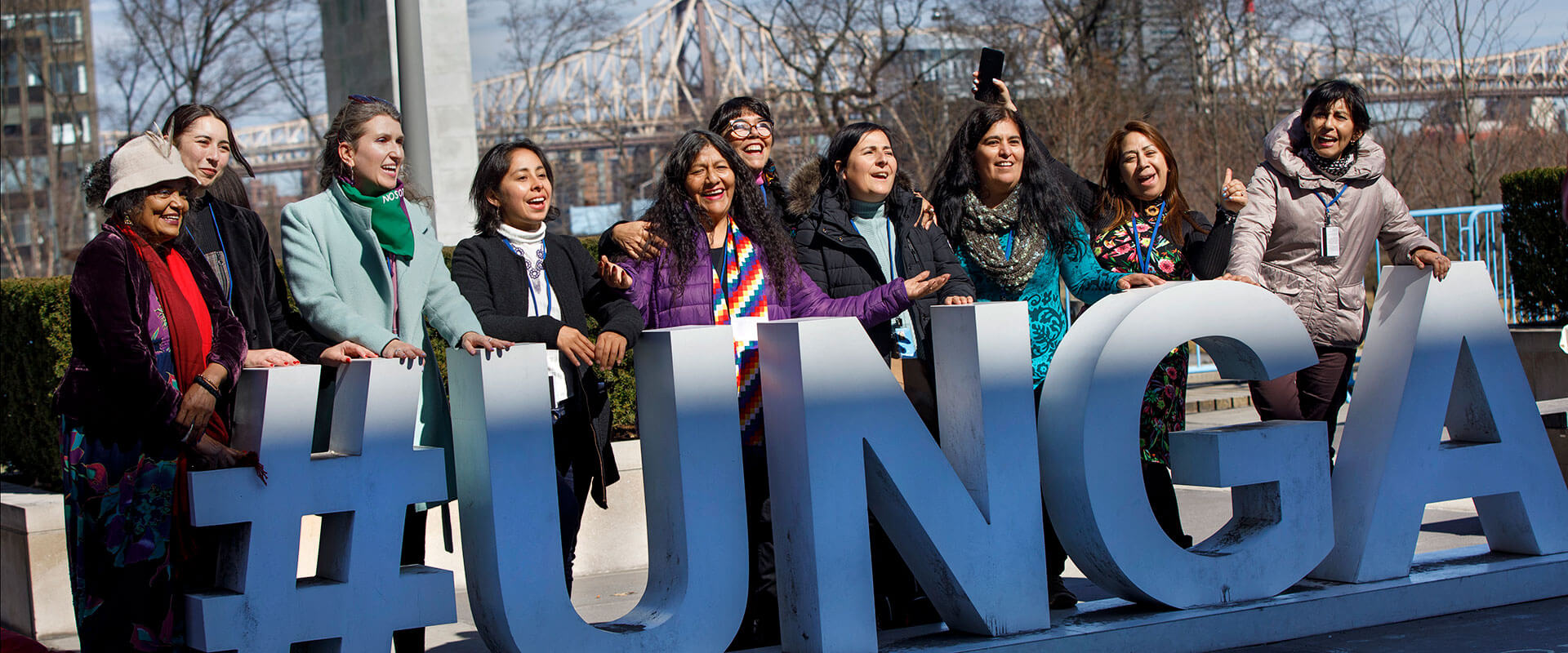 Scene outside the General Assembly building (with the #UNGA hashtag sign) following the observance of International Women’s Day 2023 at UN Headquarters in New York on 8 March 2023. Photo: UN Women/Ryan Brown.