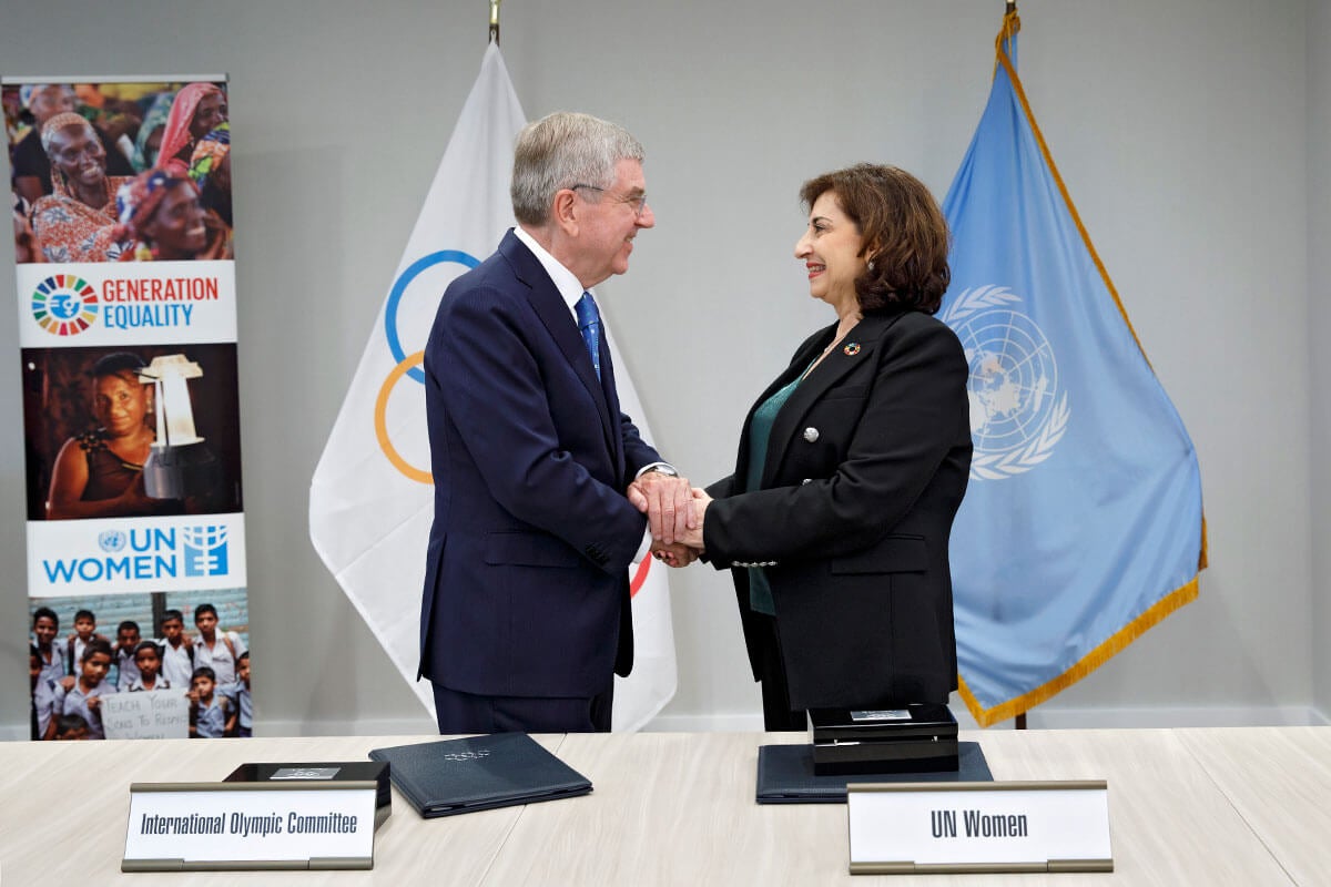 UN Women Executive Director Sima Bahous shakes hands with President of the International Olympic Committee Thomas Bach following the signing of a memorandum of understanding between the two organizations on 18 September 2023 at UN Women Headquarters in New York. Photo: UN Women/Ryan Brown.