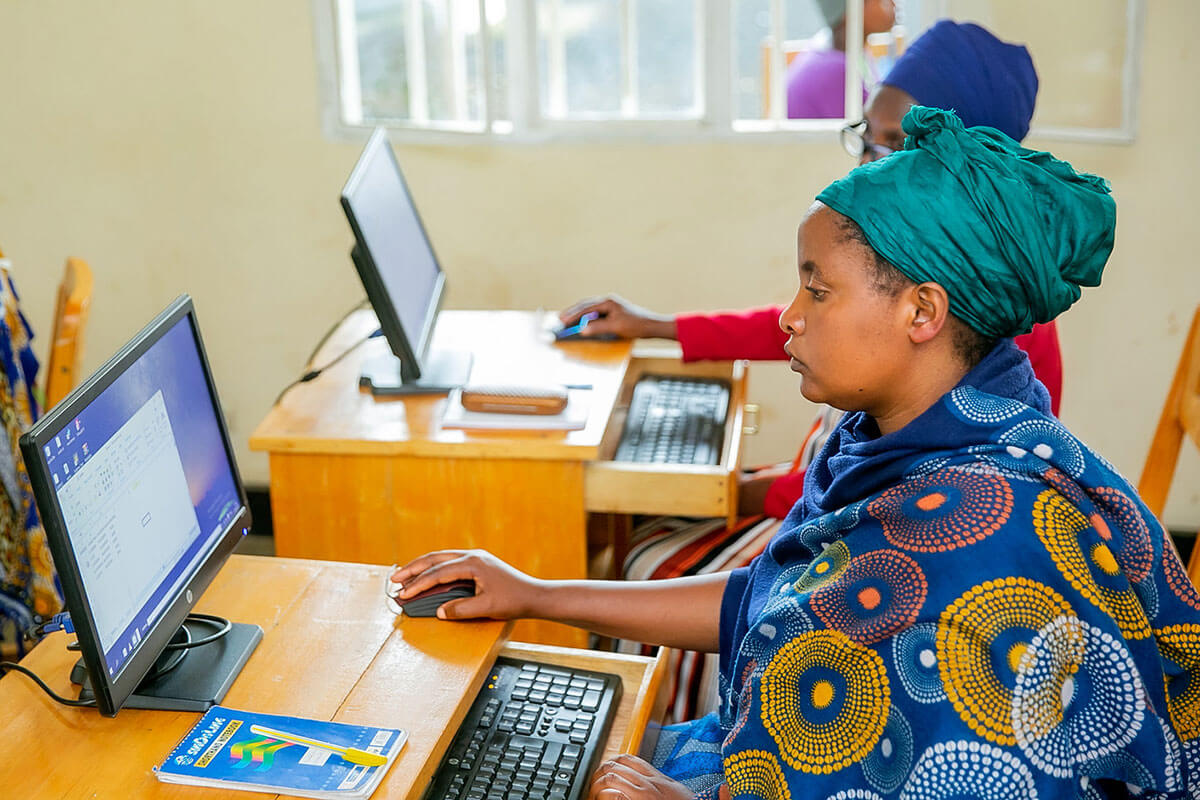 Women business owners take part in training at the ICT Chamber, an implementing partner of the Ihuzo platform, which provides digital skills to iWorkers in Rwanda, enabling them to expand their e-commerce activities. Photo courtesy of Rwanda ICT Chamber.