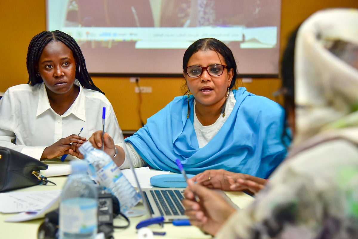 Participants interact during a conference with Sudanese women leaders in Kampala, Uganda.