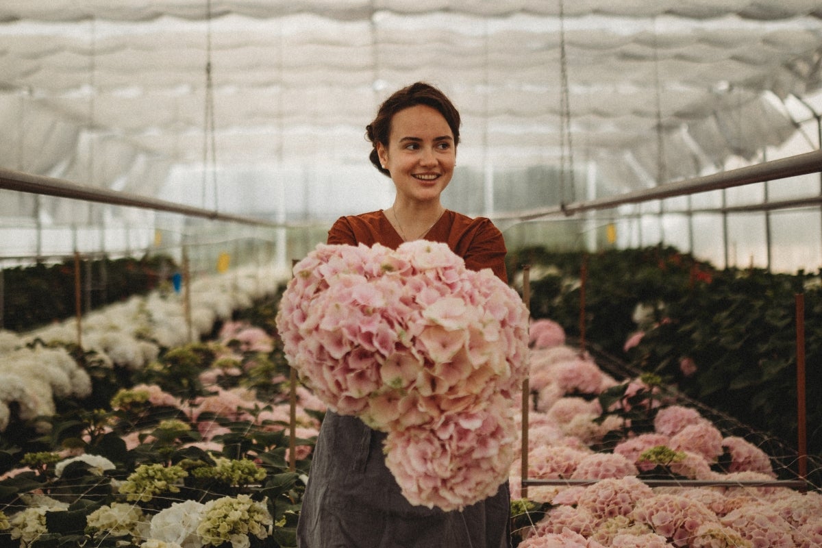 Yuliia Zavalniuk is seen at the Ukrainian flower-growing farm Villa Verde. Photo courtesy of Villa Verde