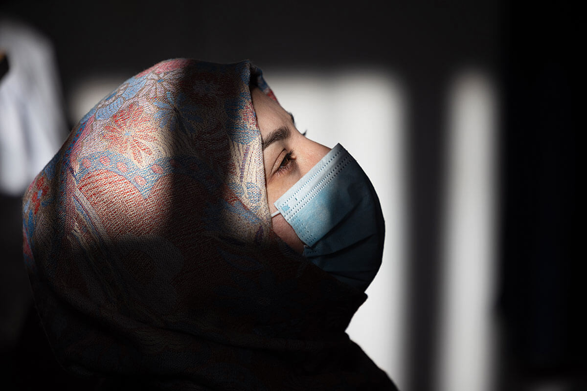 This young Afghan woman was among the thousands who have been forced to leave Pakistan. Photo: IOM/Mina Nazari.