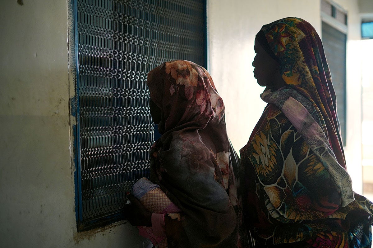 On 2 May 2023 people wait for treatment at Fashir Reproductive health centre. The centre received WASH and health supplies from UNICEF. 