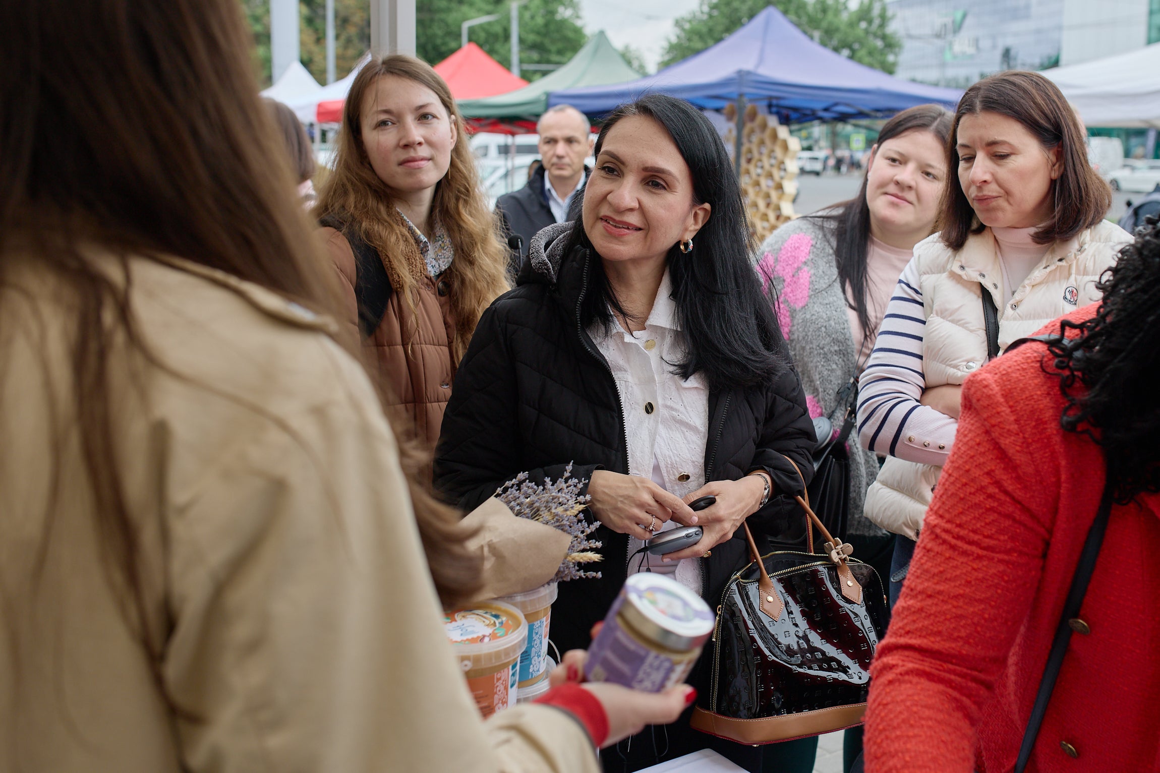 UN Women Executive Board concludes their visit to Moldova by connecting with women producers at a local market supported by UN Women. Photo: UN Women