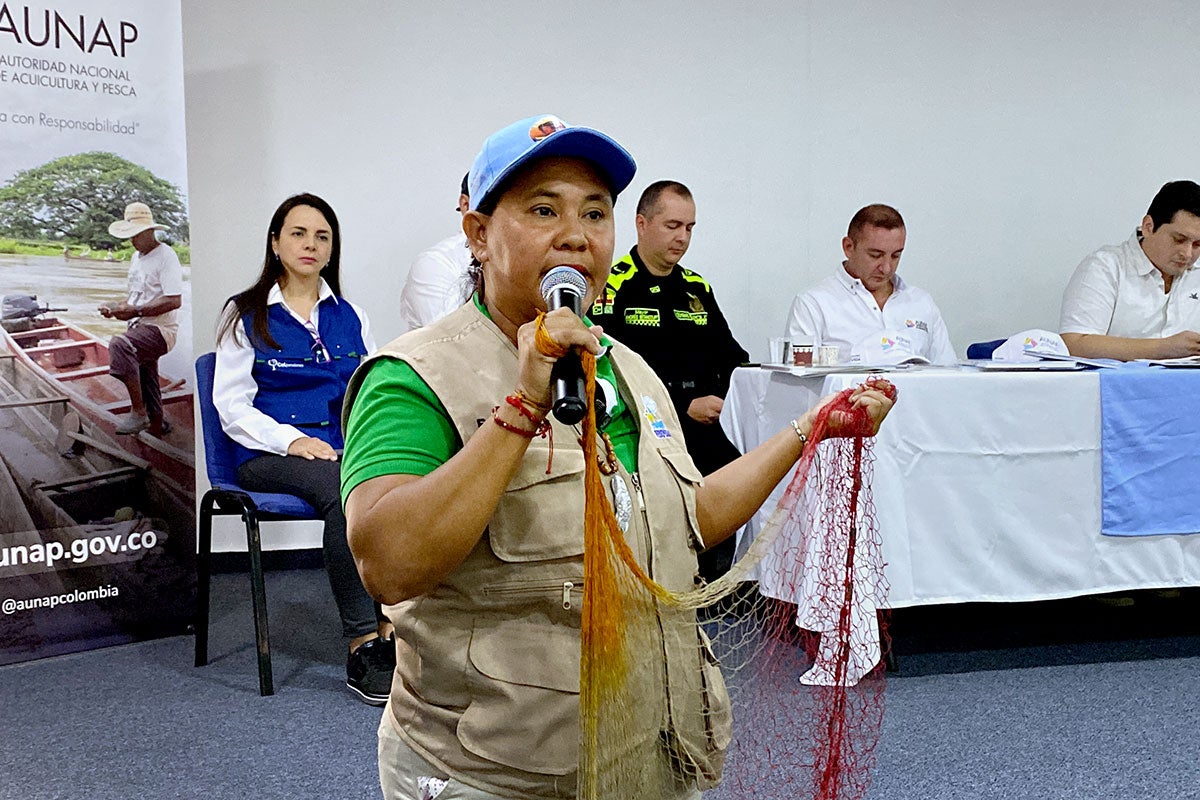 Yuli Velázquez is an environmental defender working with the fishing communities of Santander, in northern Colombia. Photographed here, she is speaking at an event that brought together women fishers from different parts of Colombia.
