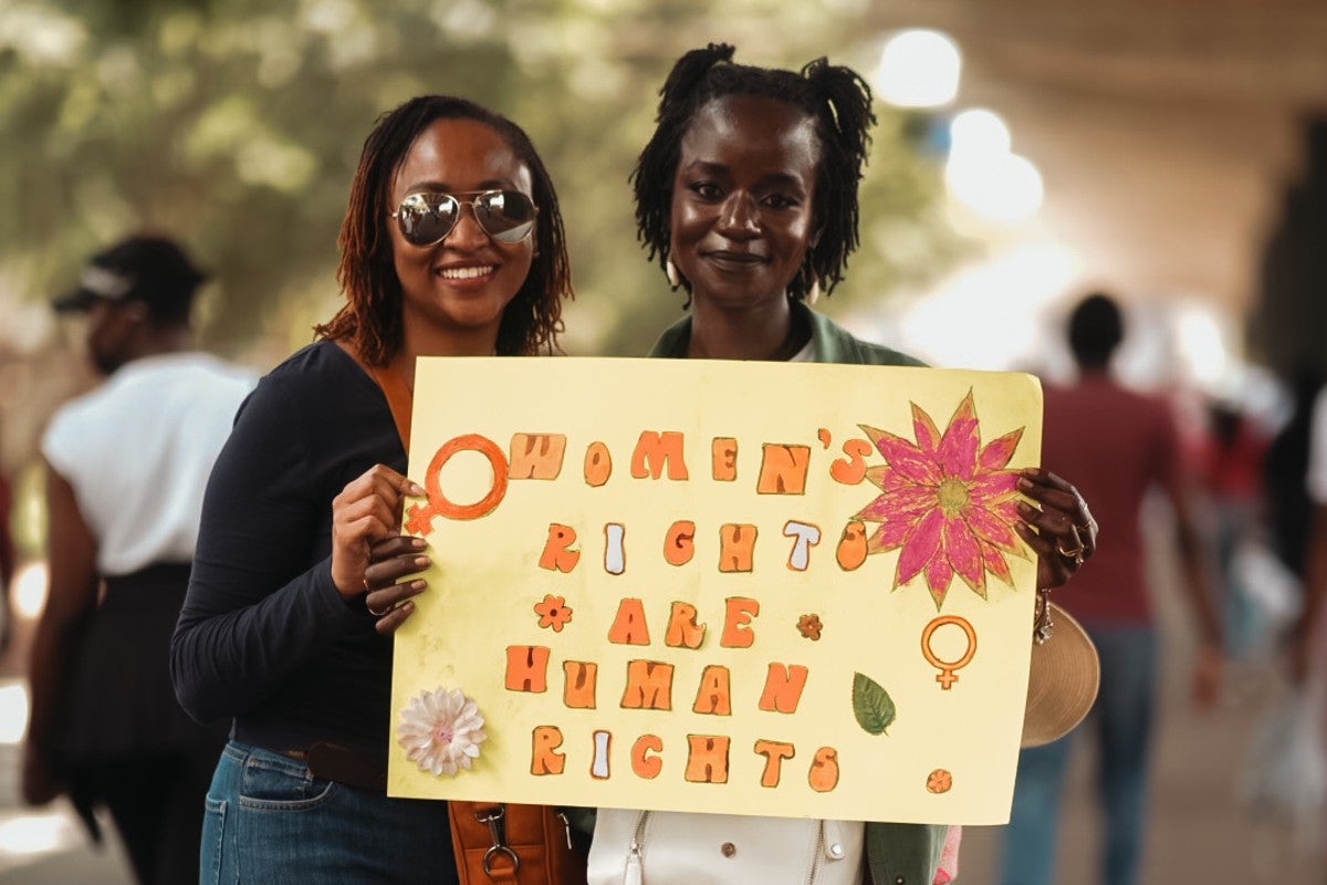 A mother and daughter march for women's rights in Kenya, November 2024. Photo: UN Women. 