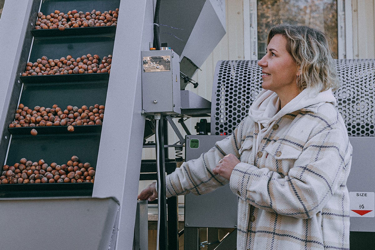 Nina Smyrnova founded a 25 hectare farm eco-estate in the south of the Kyiv region that approaches cultivation of hazelnuts and asparagus with sustainable cutting-edge agricultural practices. Photo: UN Women/Nadia Berska