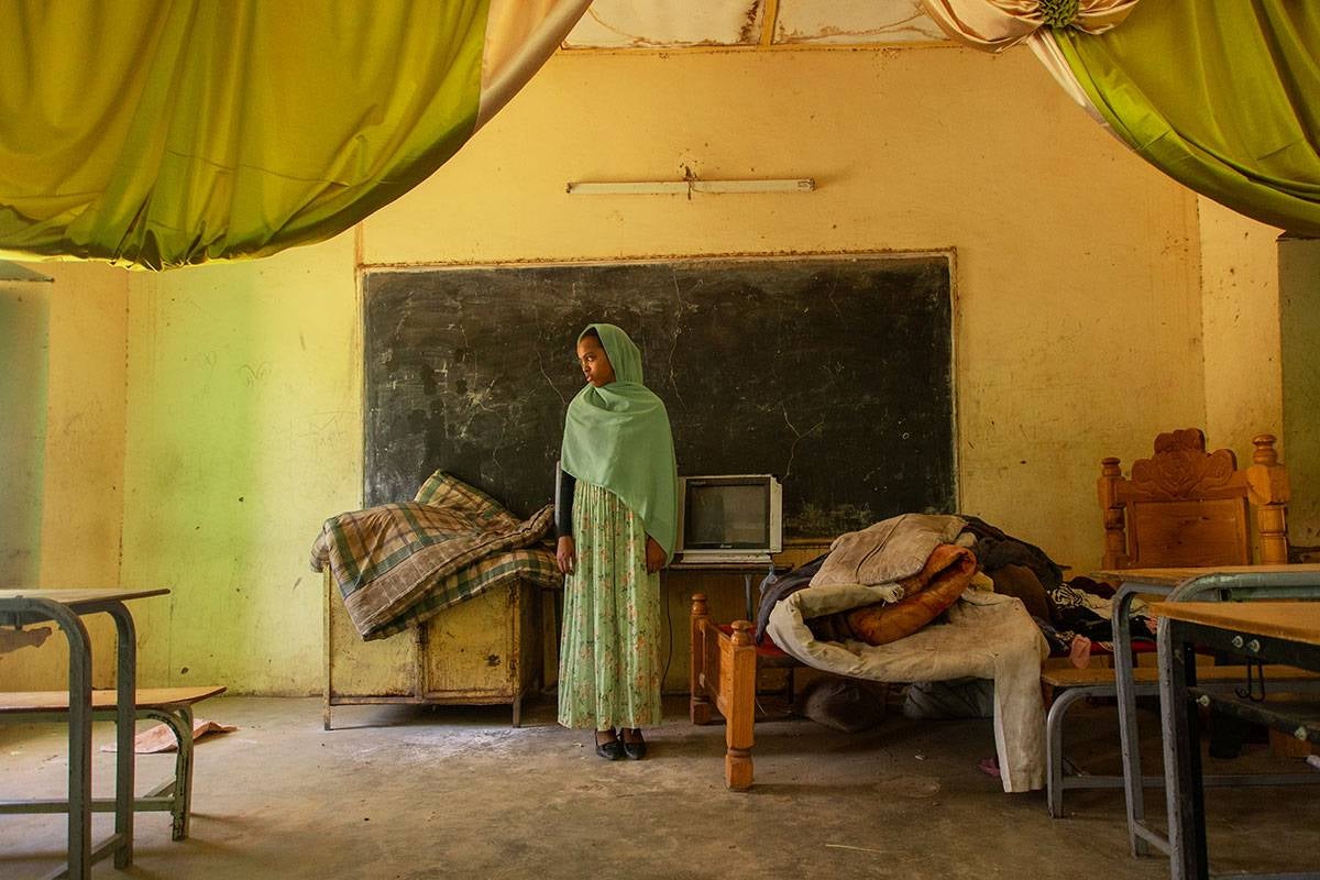 When the conflict erupted in Khartoum, Ruweda and hersiblings fled without their father. Its been a whole year since they last saw him.. Kassala state, March 2024. Photo: UNICEF/UNI547360/Ahmed Mohamdeen Elfatih.