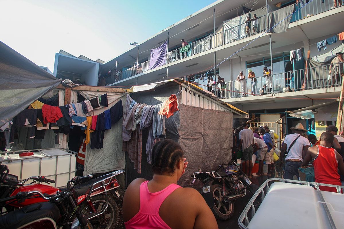 The site for displaced people hosted at Marie-Jeanne school in Port-au-Prince, where 7,000 people live in overcrowded and desperate conditions, seeking safety amidst the ongoing armed violence in Haiti, 18 March 2025. Photo: UNICEF/UNI769396/Patrice Noel