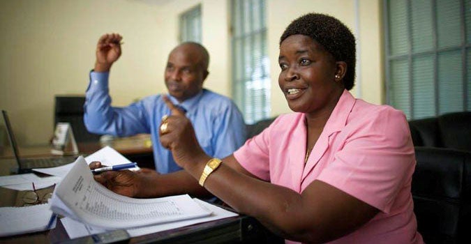 Civil service support officers providing on-the-job training to their South Sudanese counterparts. (Photo: UNDP South Sudan/Brian Sokol.)