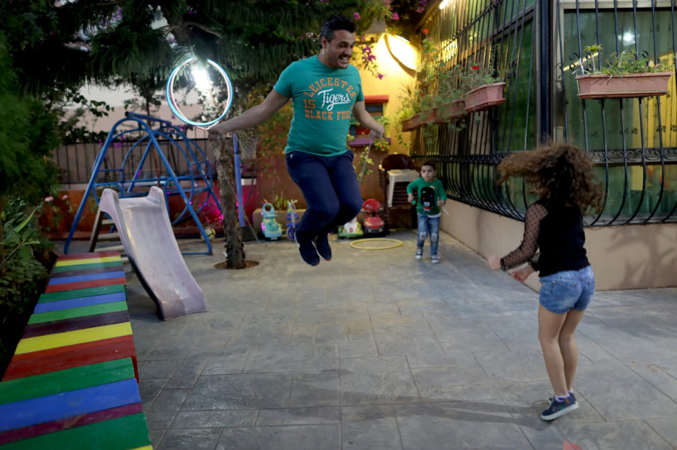 Ahmed Fakih enjoys being equally involved in his children’s upbringing. Photo: UN Women/Marwan Tahtah.