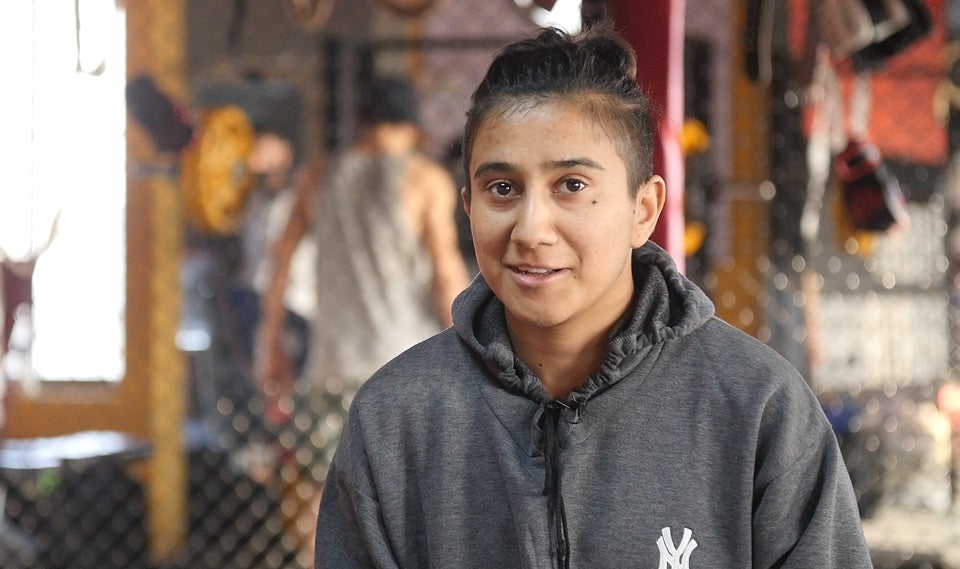 Anita Karim poses at the gym where she trains in Islamabad; this photo was taken on 21 February 2021. Photo: UN Women/The Centrum Media