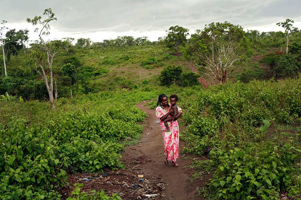 On the edge of the Gado-Badzere refugee camp, a path leads out into the bush, where women must go to collect firewood to use for cooking. Photo: UN Women/Ryan Brown